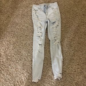 American Eagles Hi-Rise crop length light wash ripped jeans
